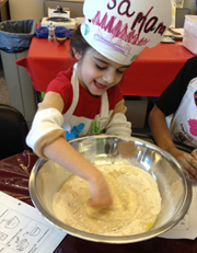 Chef Saman mixes the dough with the fanciest kitchen tool ever—her finger! Photo by Barb Finley