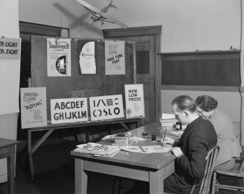 Adult Education painting signs